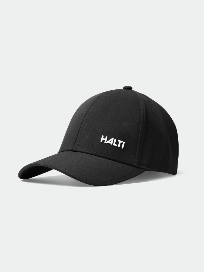 The Halti Mattas black quick-dry baseball cap, made from recycled materials, shown on a light background.