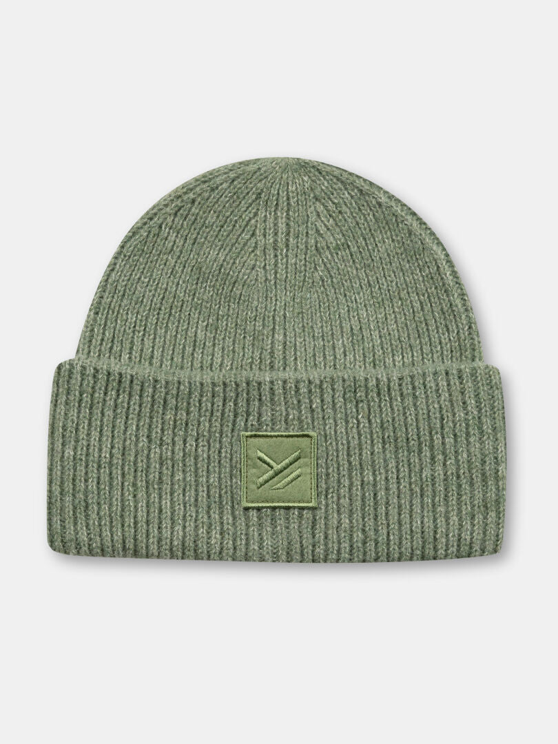 Halti Huurre Beanie: Olive rib knit, folded brim, insulating with a minimalist arrow patch.