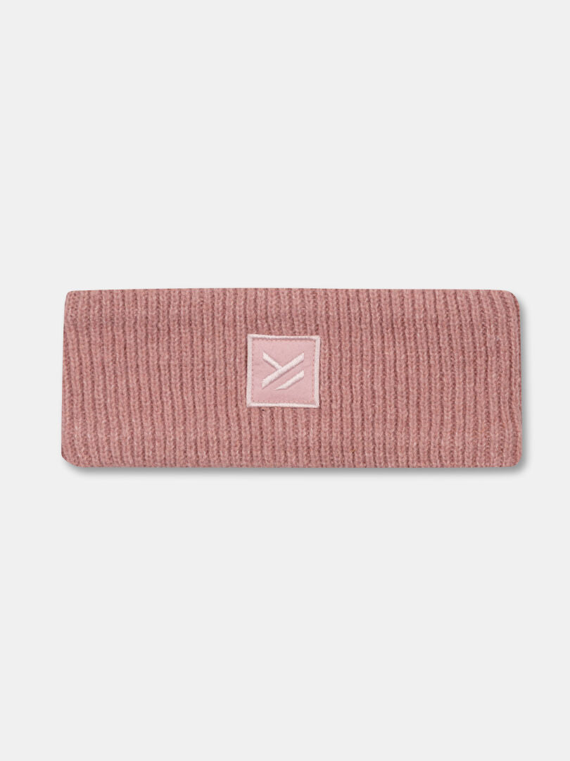 The Halti Huurre Headband is a pink ribbed wool knit with a central white logo, ideal as a winter ear warmer.