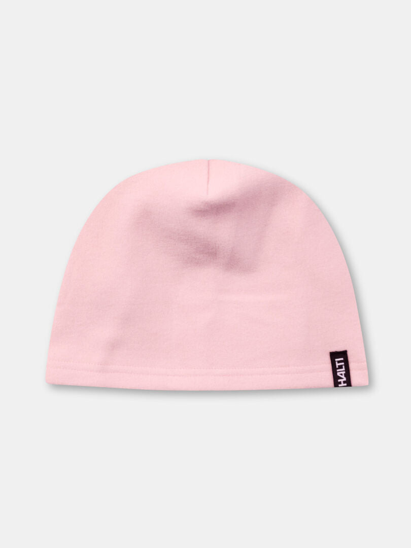 Halti Trone Fleece Beanie in light pink with black and white tag, ideal for winter workouts, shown on gray background.
