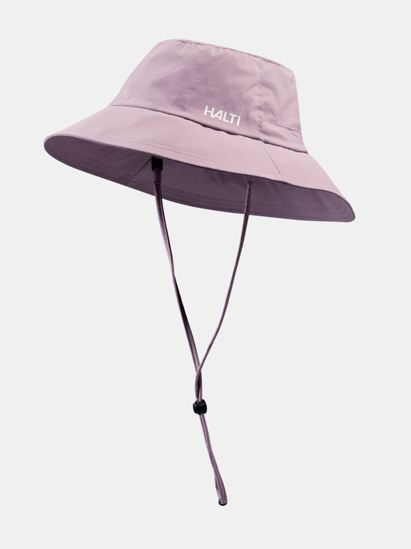 The Luovi Bucket Hat by Halti is light purple, quick-drying, features a chin strap, and 
