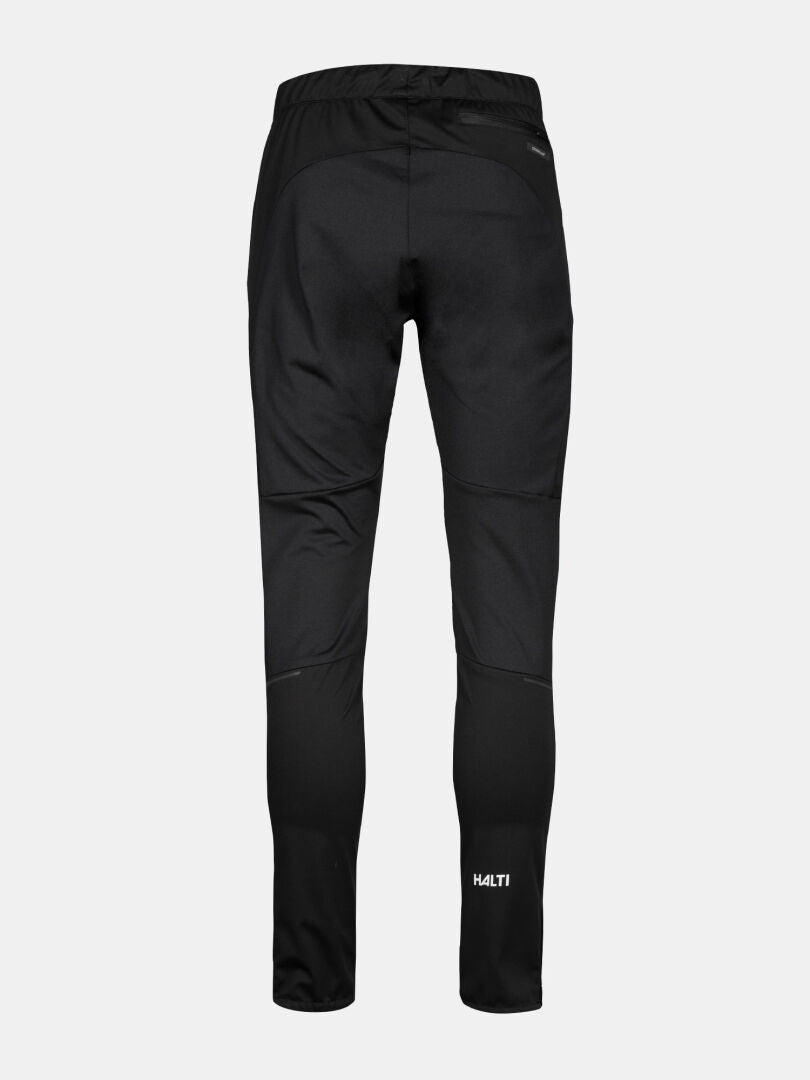 Halti Framover XCT Pants Men's in black, fitted style, shown from the back with logo near the left ankle.