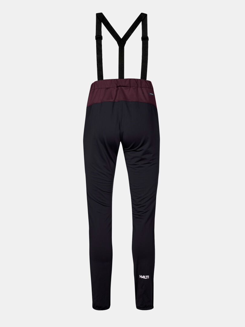 Halti Huuru XC Set Women's Plus—black athletic pants with suspenders for winter training or XC skiing, back view shown.