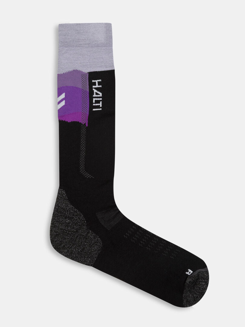 Black merino wool Tunturit Ski Socks with a grey cuff and a purple mountain-scape pattern.
