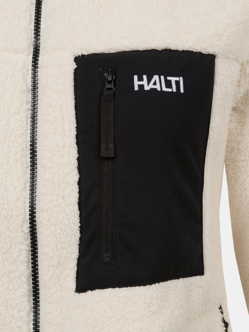 Close-up of Halti Lumista Polar Fleece Jacket Women’s, featuring black chest pocket and white logo above vertical zipper.
