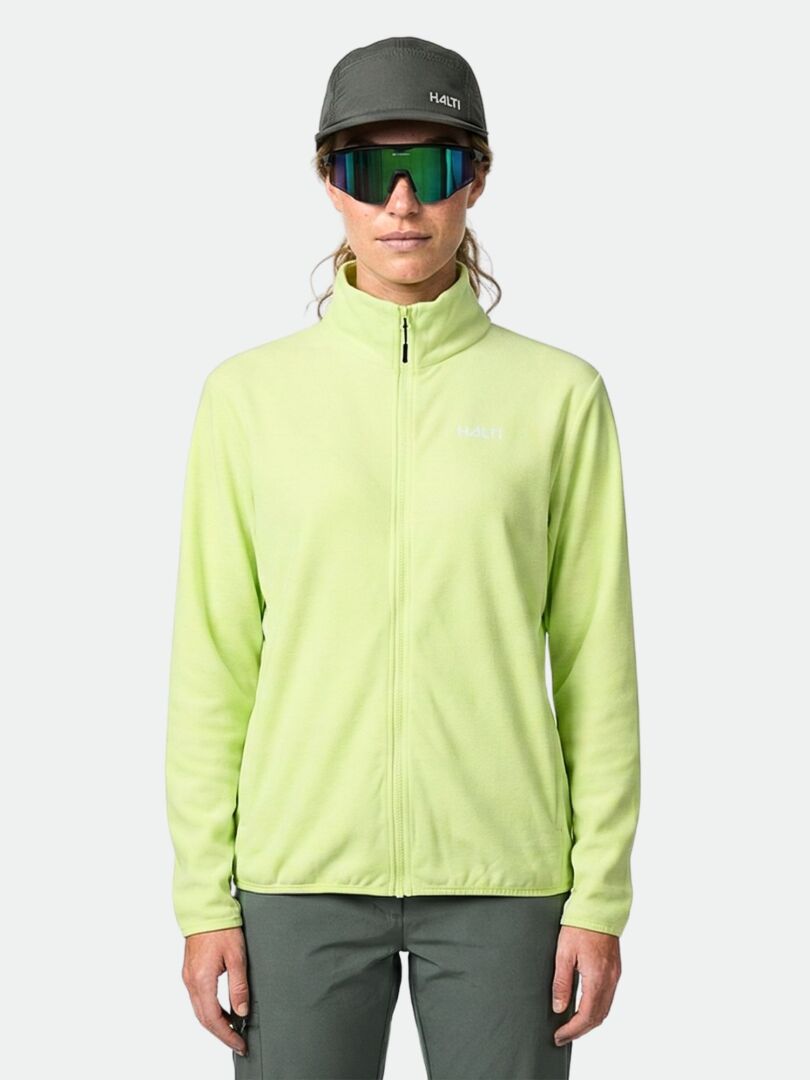 Wearing a Halti Rockmoon Fleece Jacket Women's in light green, dark pants, gray cap, and reflective sunglasses.