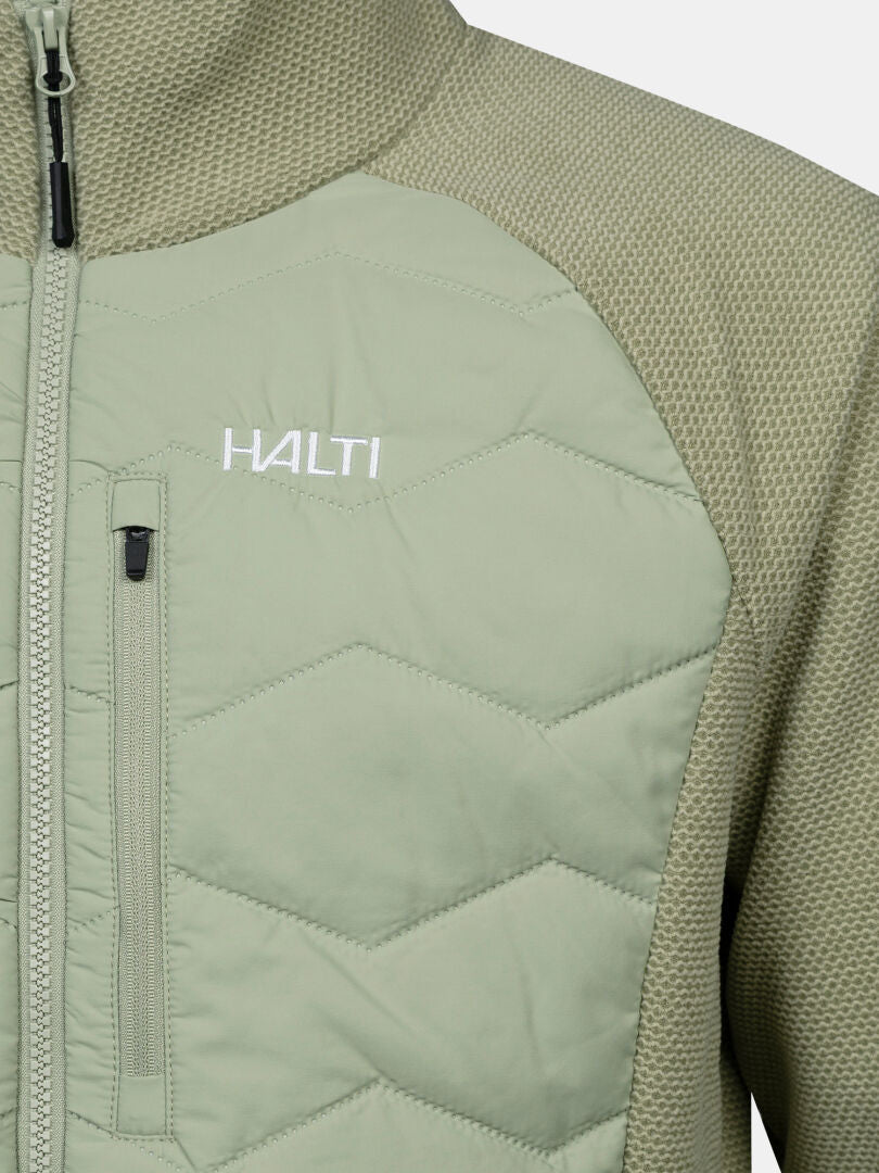 Close-up of the Halti Suomis Hybrid Layer Jacket Men’s in light green with zip chest pocket and hexagonal quilting.
