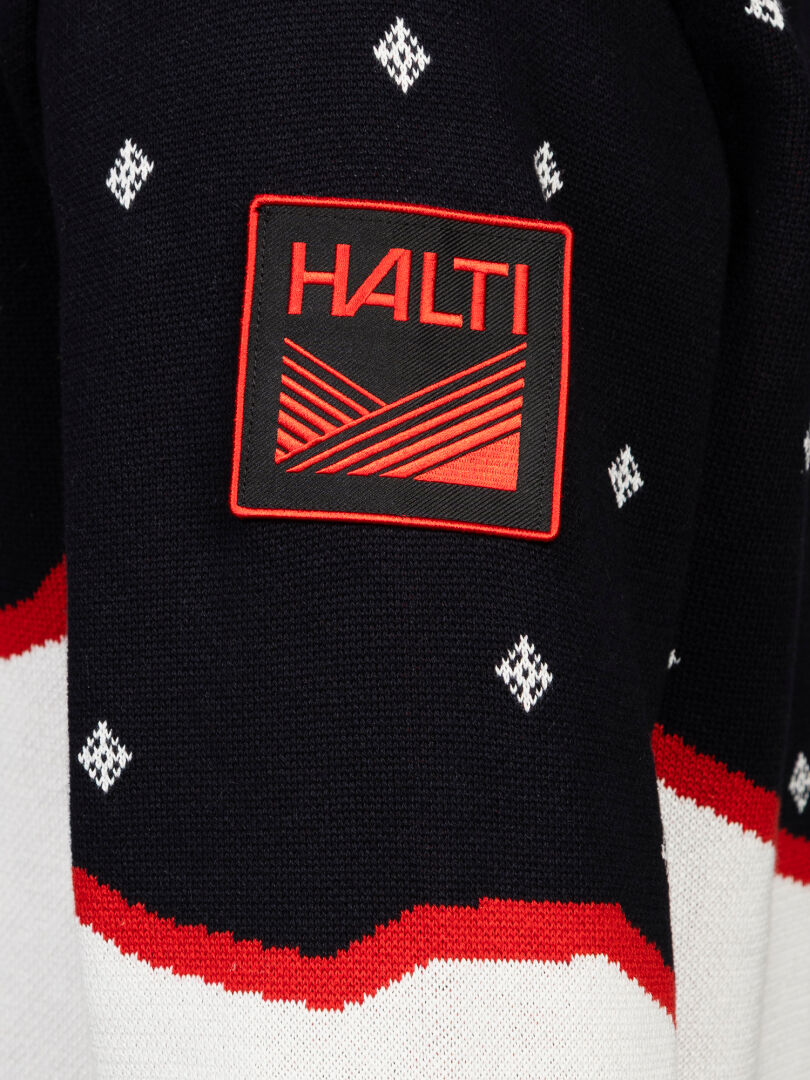 Halti Tauko Unisex Sweater: Black cotton knit with white diamonds and red-black HALTI patch, perfect for daily wear.