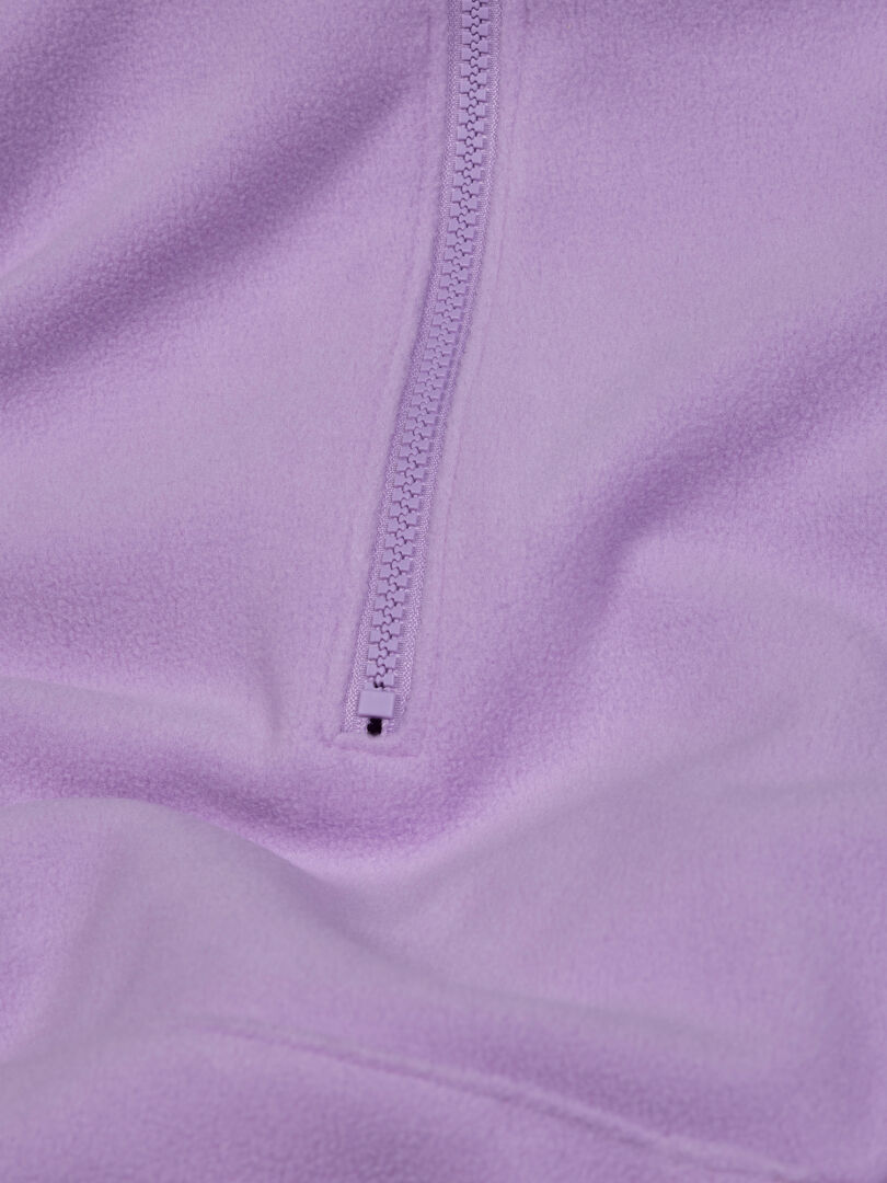 Close-up of Halti Susanne Fleece Hoodie Women’s Plus in lavender, showing a partially unzipped center zipper.